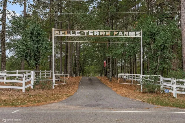 a kitchen with stainless steel appliances granite countertop a refrigerator and a stove