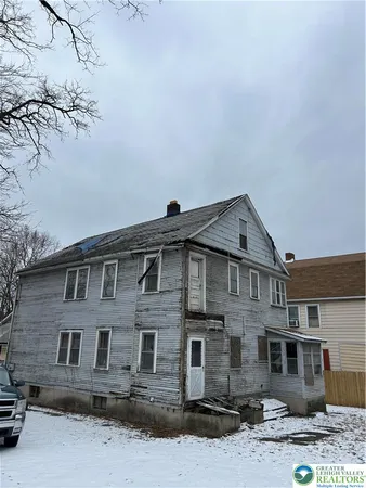 front view of a house with a street