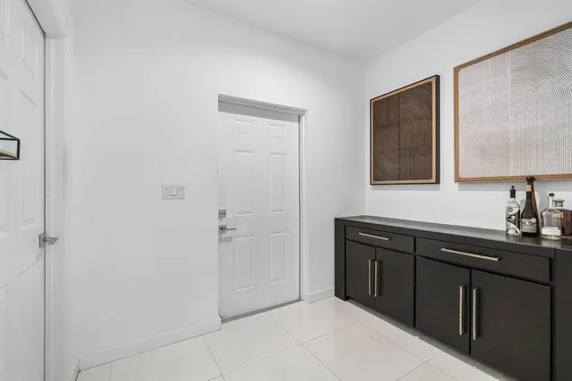 a bathroom with a sink and mirror