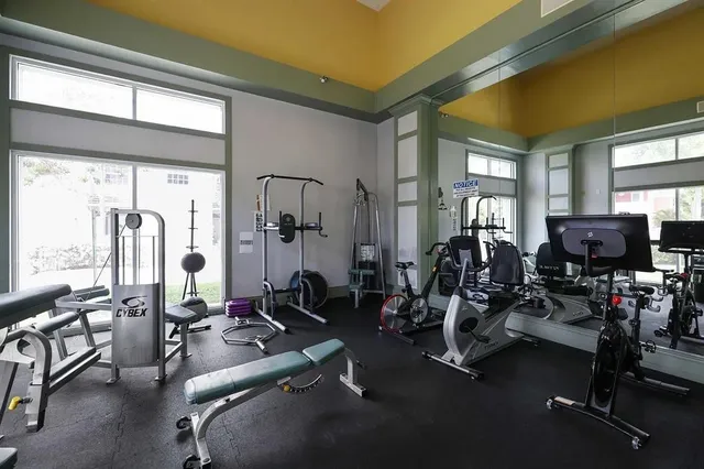 a view of a room with gym equipment