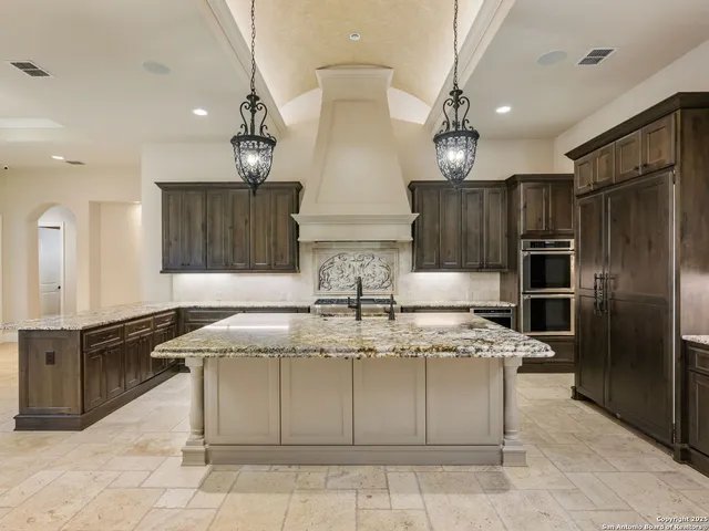 a spacious bathroom with a tub sink shower and mirror