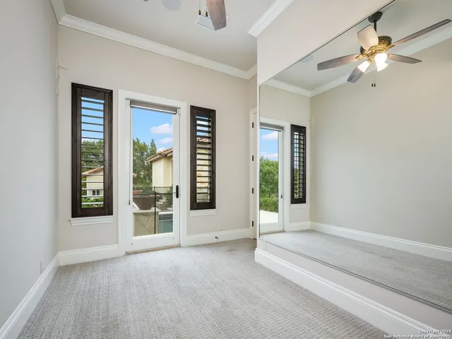 a view of a house with swimming pool and furniture
