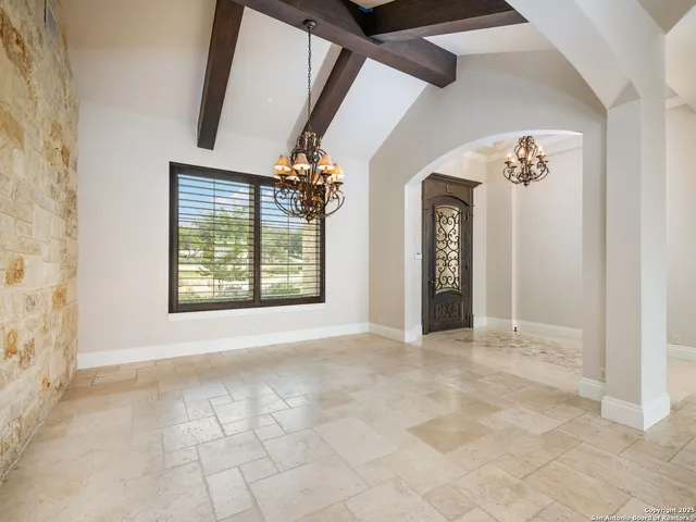 a view of a kitchen with furniture and a fireplace