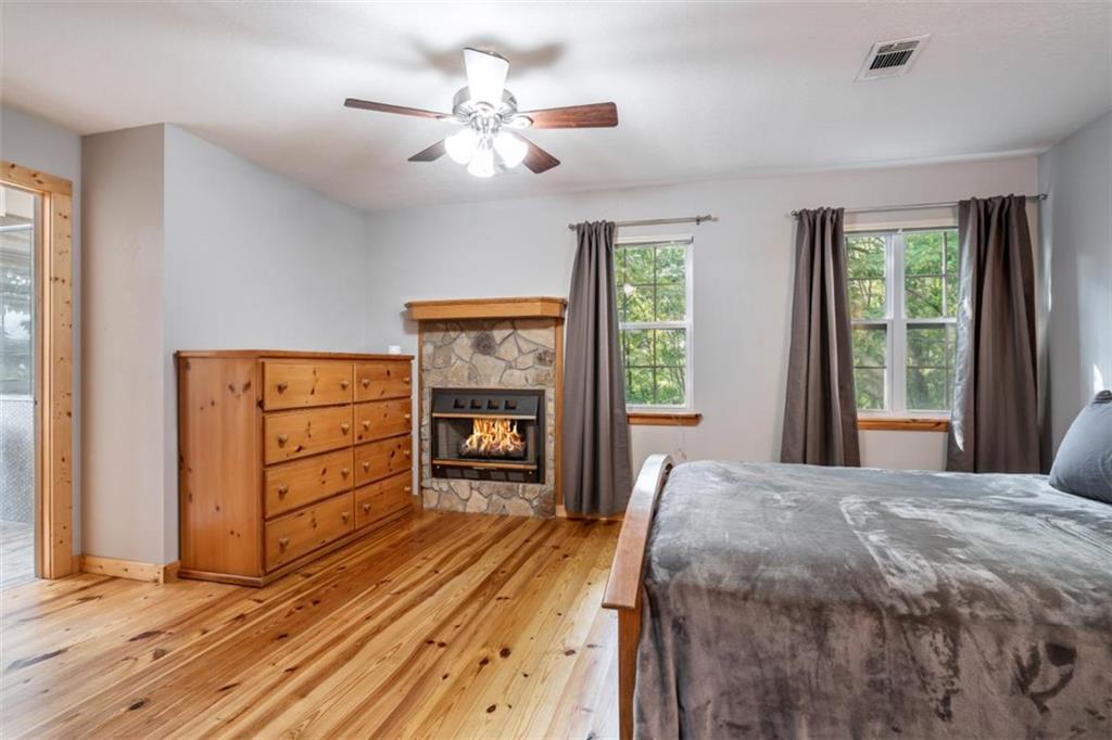 349 Moon Shadow View North Blairsville, GA 30512 - Photo 29 of 74 a bedroom with a bed dresser and a window