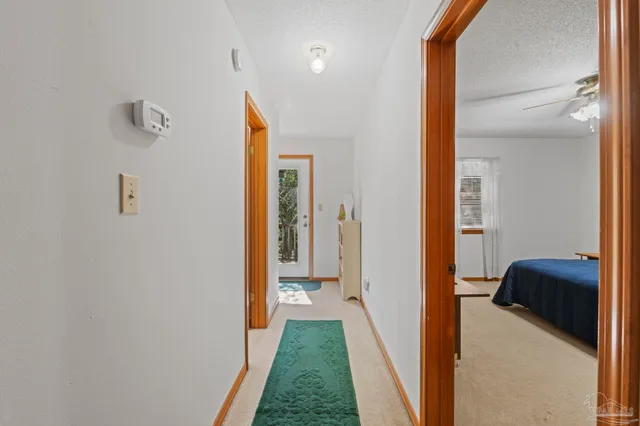 a bathroom with a double vanity sink mirror and toilet