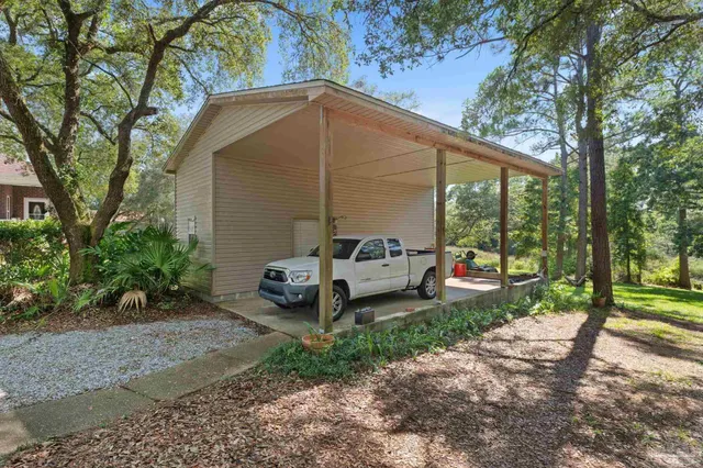 a view of a back yard of a house
