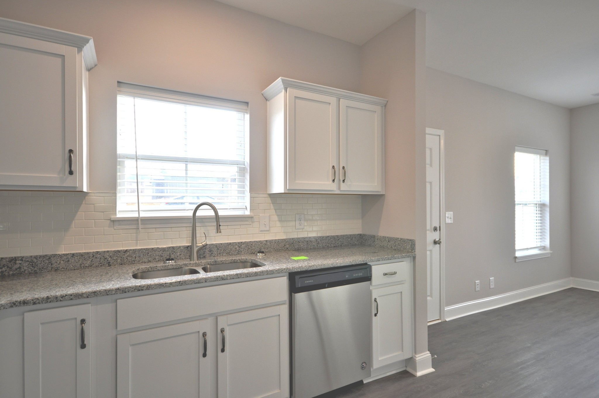 200 Bainbridge Drive, Unit A Clarksville, TN 37043 - Photo 12 of 35 a kitchen with granite countertop white cabinets and a sink
