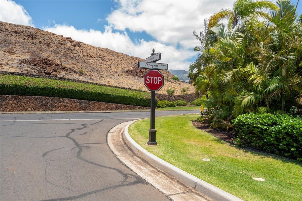 4 Anapuni Loop Lahaina, HI 96761 - Photo 16 of 44 a swimming pool with some trees in the background