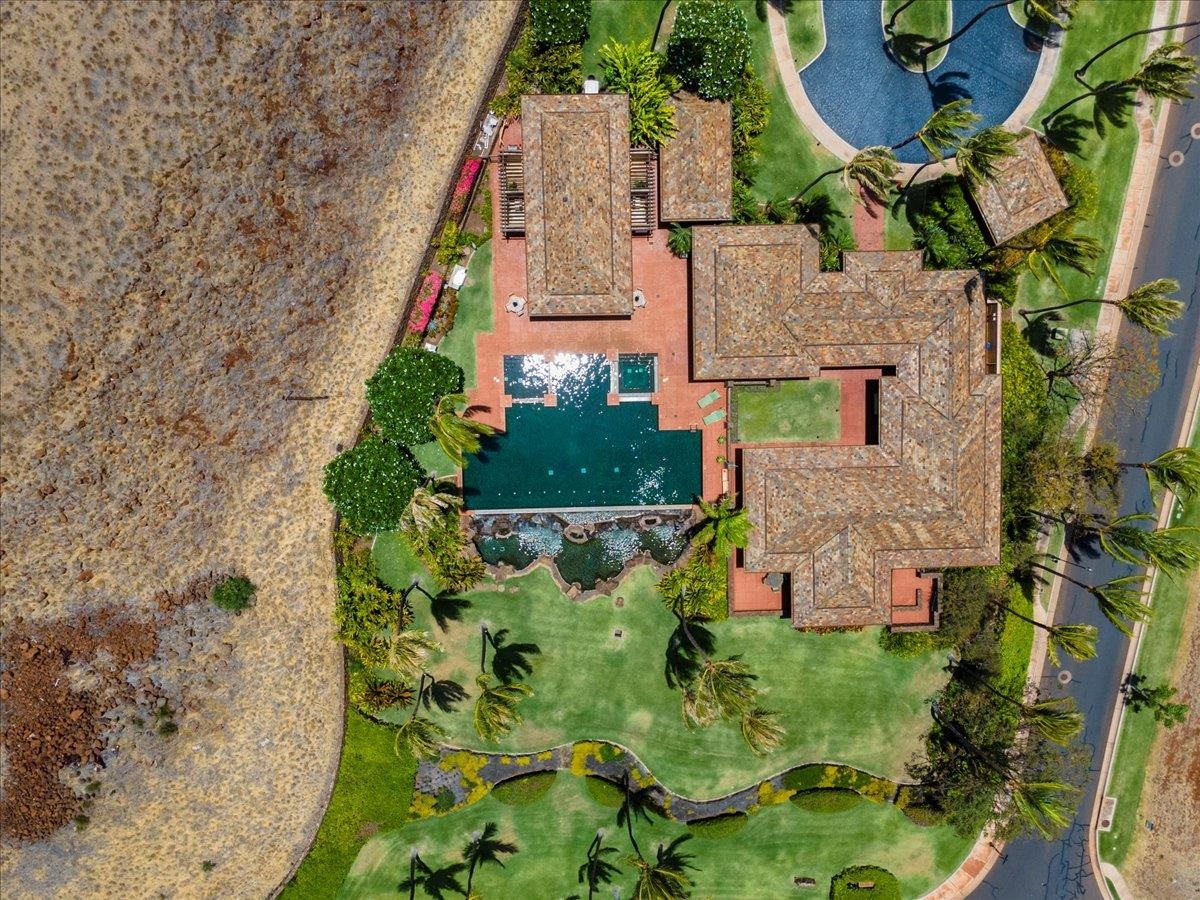 4 Anapuni Loop Lahaina, HI 96761 - Photo 23 of 44 an aerial view of a house with a yard and large trees
