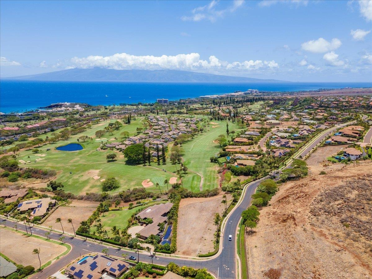 4 Anapuni Loop Lahaina, HI 96761 - Photo 9 of 44 an aerial view of residential building and ocean