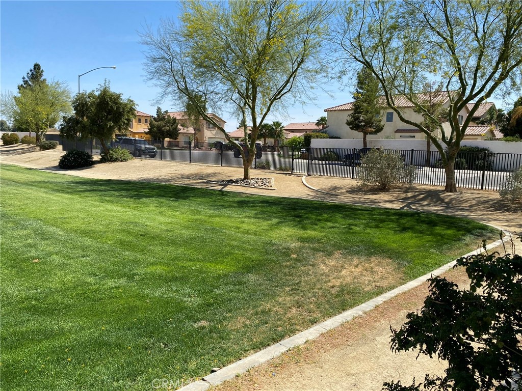 0 San Rey Drive Coachella, CA 92236 - Photo 2 of 10 a garden with trees in the background
