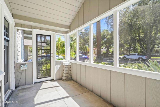 a view of a large window with an outdoor space