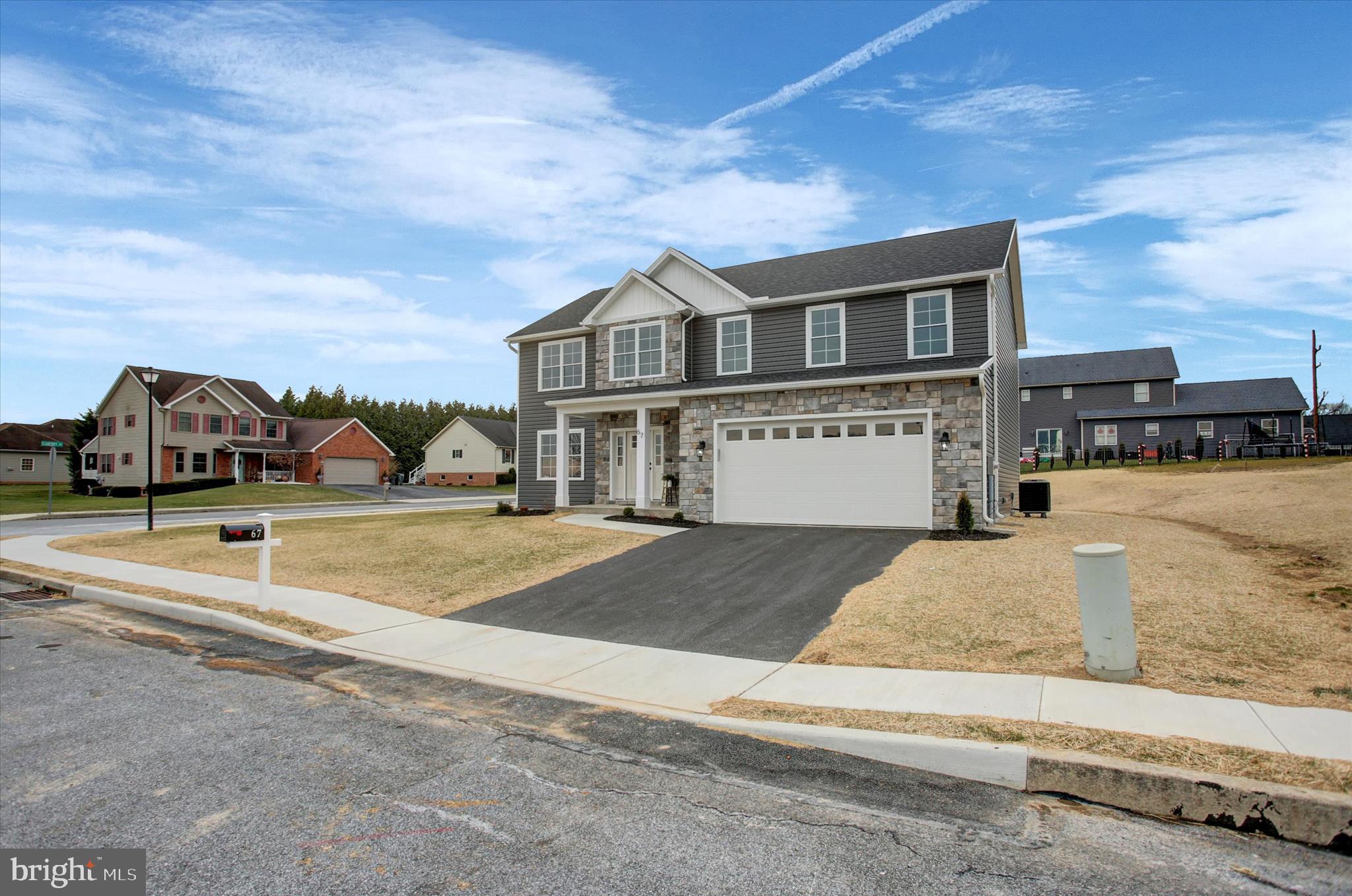 67 James Way Greencastle, PA 17225 - Photo 3 of 41 a front view of a house with a yard