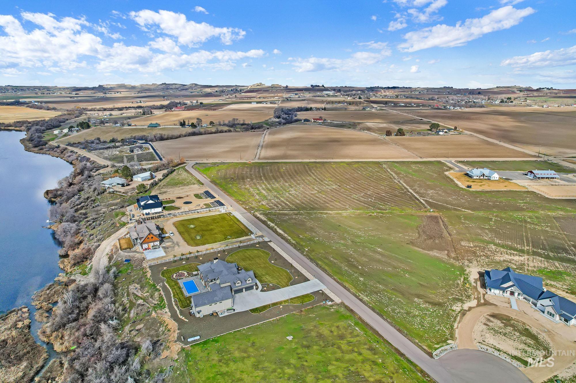 Tbd Tbd Tbd Cabernet Lane Caldwell, ID 83607 - Photo 12 of 20 Aerial view of property's location featuring rural landscape and extensive farmland