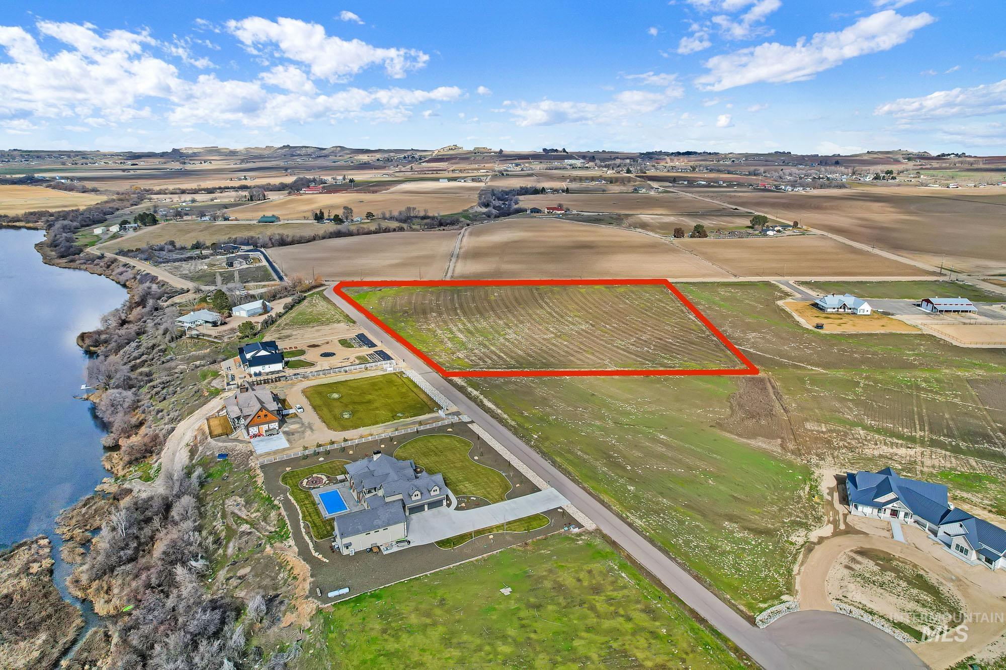 Tbd Tbd Tbd Cabernet Lane Caldwell, ID 83607 - Photo 13 of 23 Aerial overview of property's location featuring property boundaries highlighted, rural landscape, and rows of crops