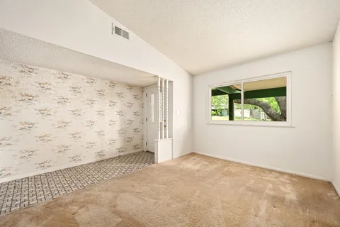 an empty room with windows