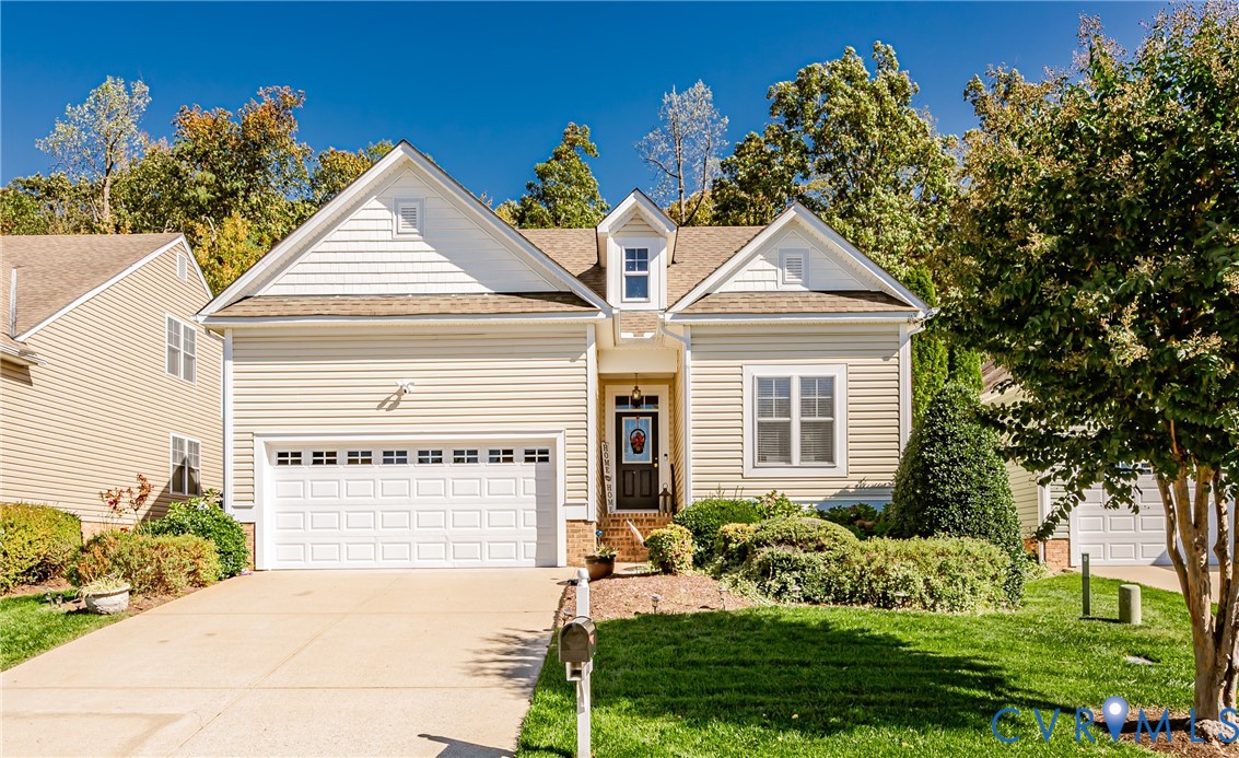 1113 Alcorn Terrace Midlothian, VA 23114 - Photo 1 of 44 a front view of a house with a yard