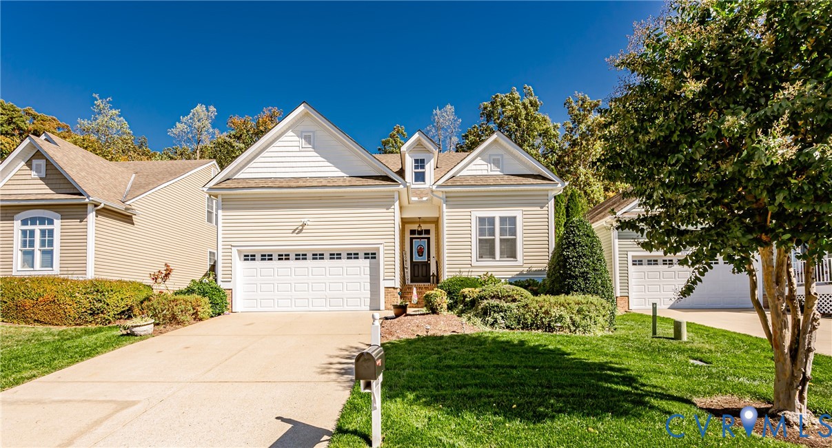 1113 Alcorn Terrace Midlothian, VA 23114 - Photo 2 of 44 a front view of a house with garden
