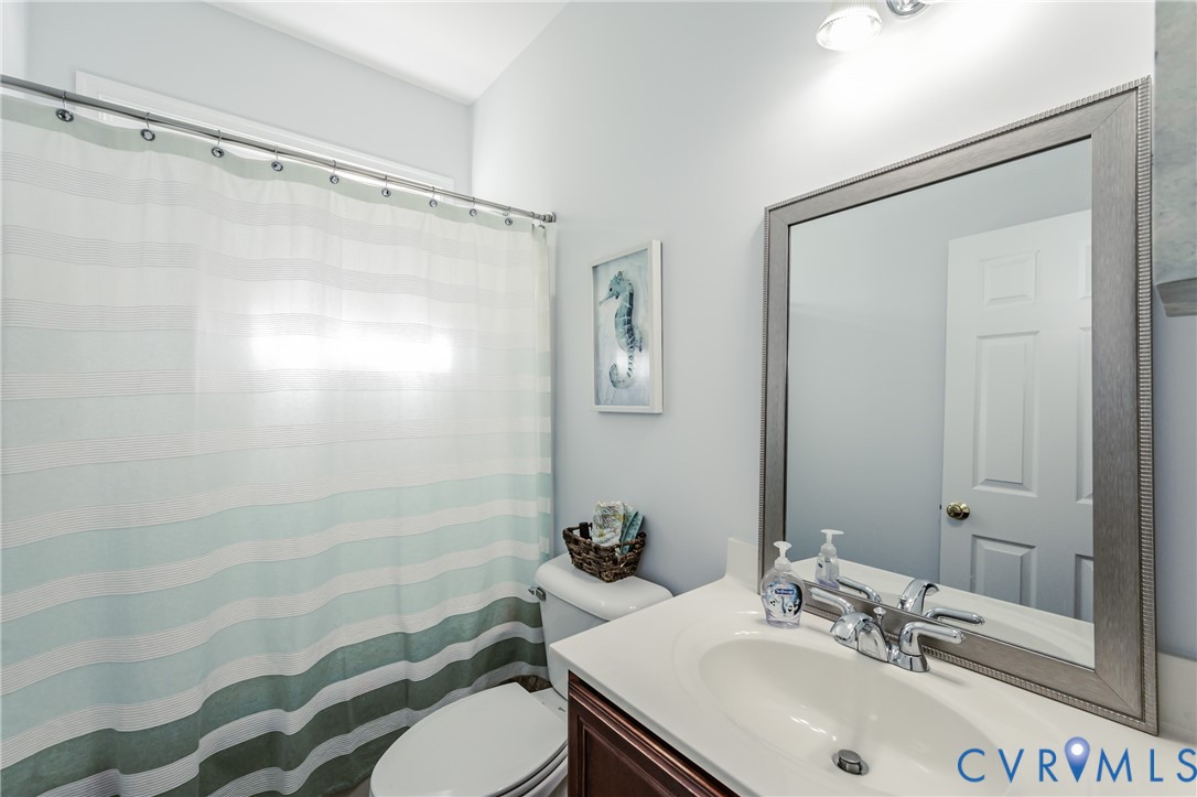 1113 Alcorn Terrace Midlothian, VA 23114 - Photo 39 of 44 a bathroom with a sink toilet and shower