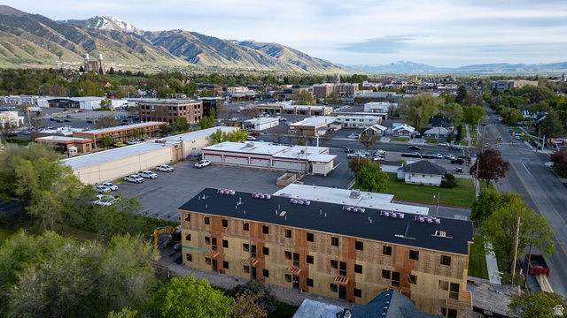 452 North 100 West, Unit 102 Logan, UT 84321 - Photo 34 of 34 Drone / aerial view of a mountain backdrop