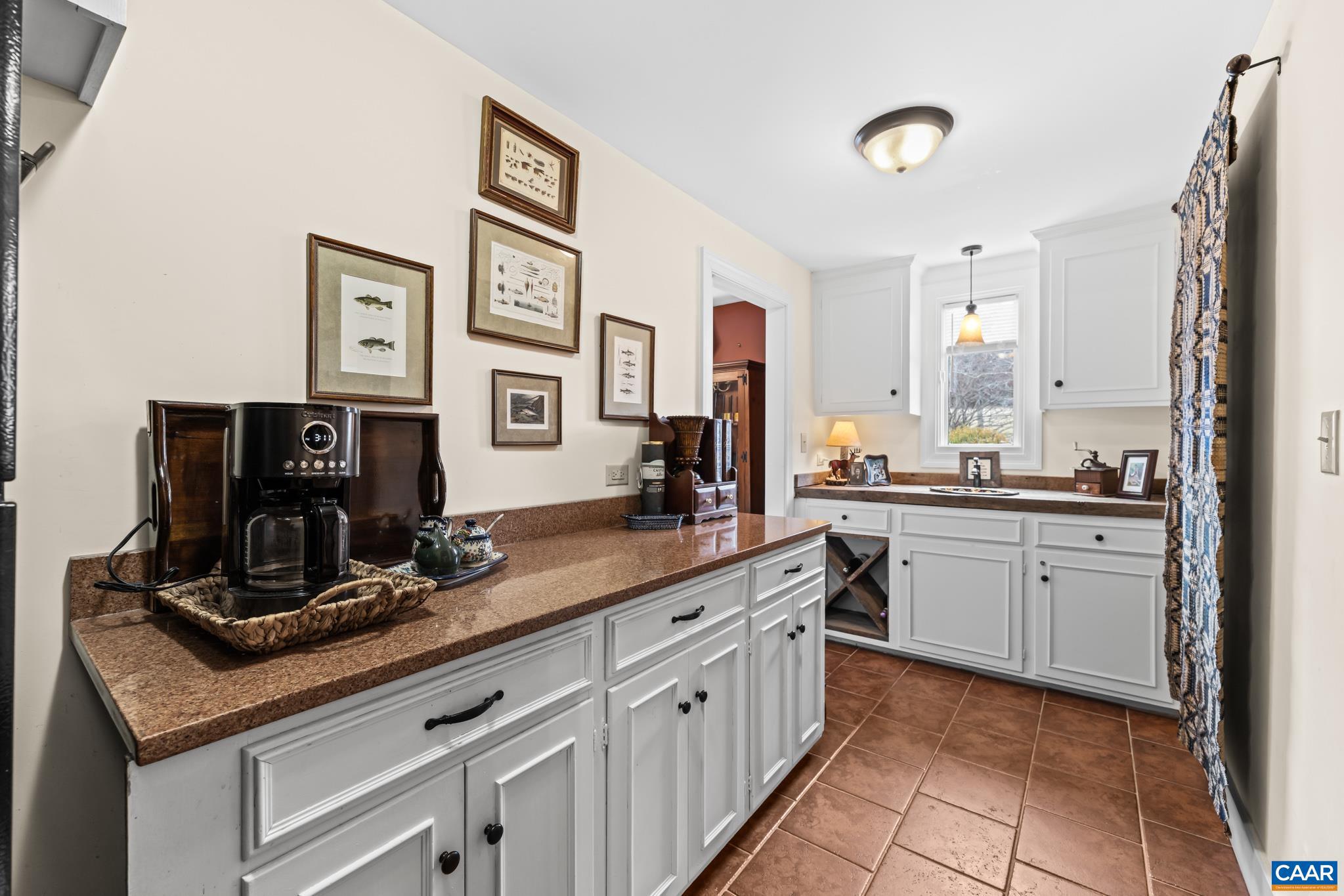 1128 Beaverdam Road Keswick, VA 22947 - Photo 37 of 74 a kitchen with cabinets stainless steel appliances a sink and a window