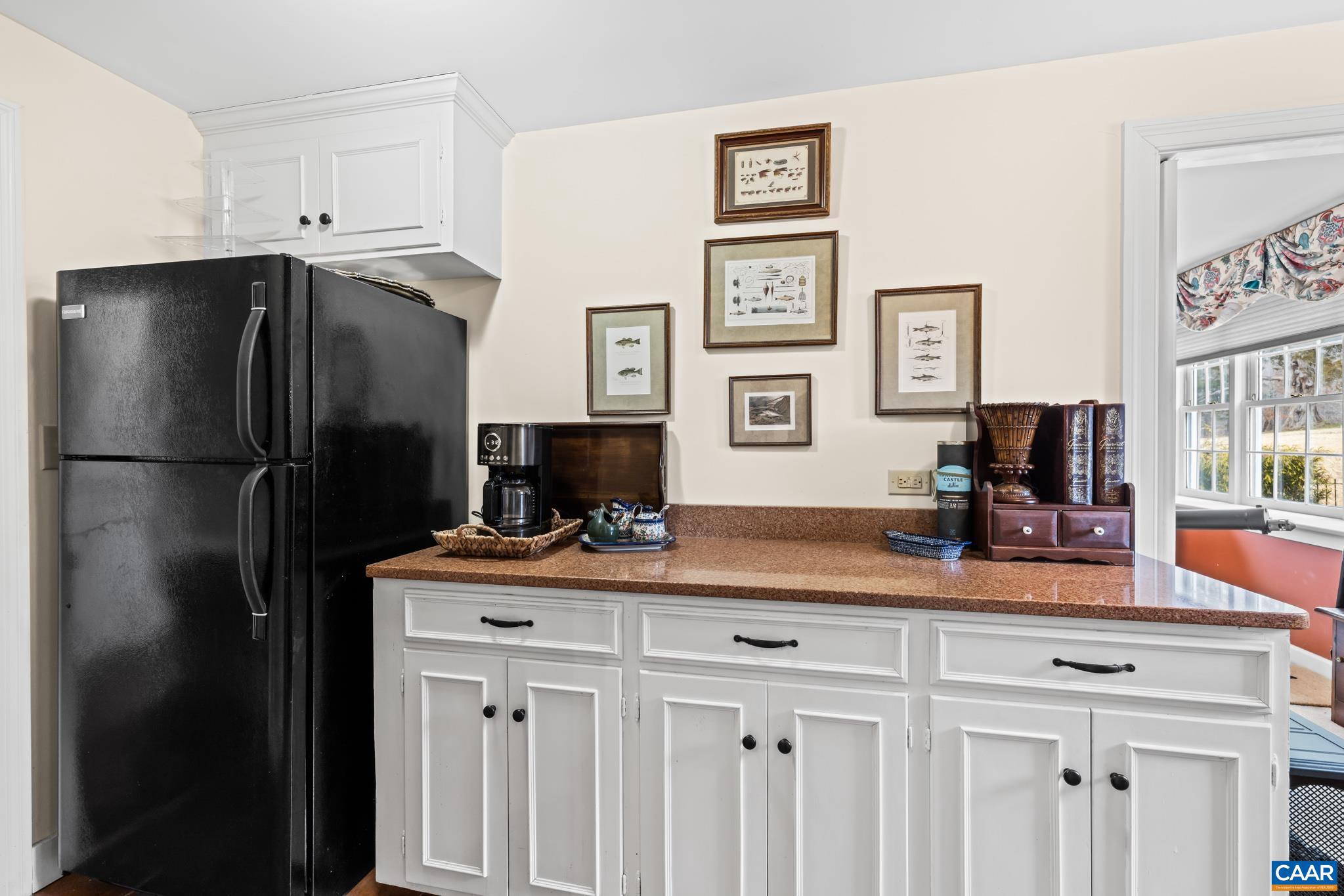 1128 Beaverdam Road Keswick, VA 22947 - Photo 38 of 74 a kitchen with a refrigerator and a sink