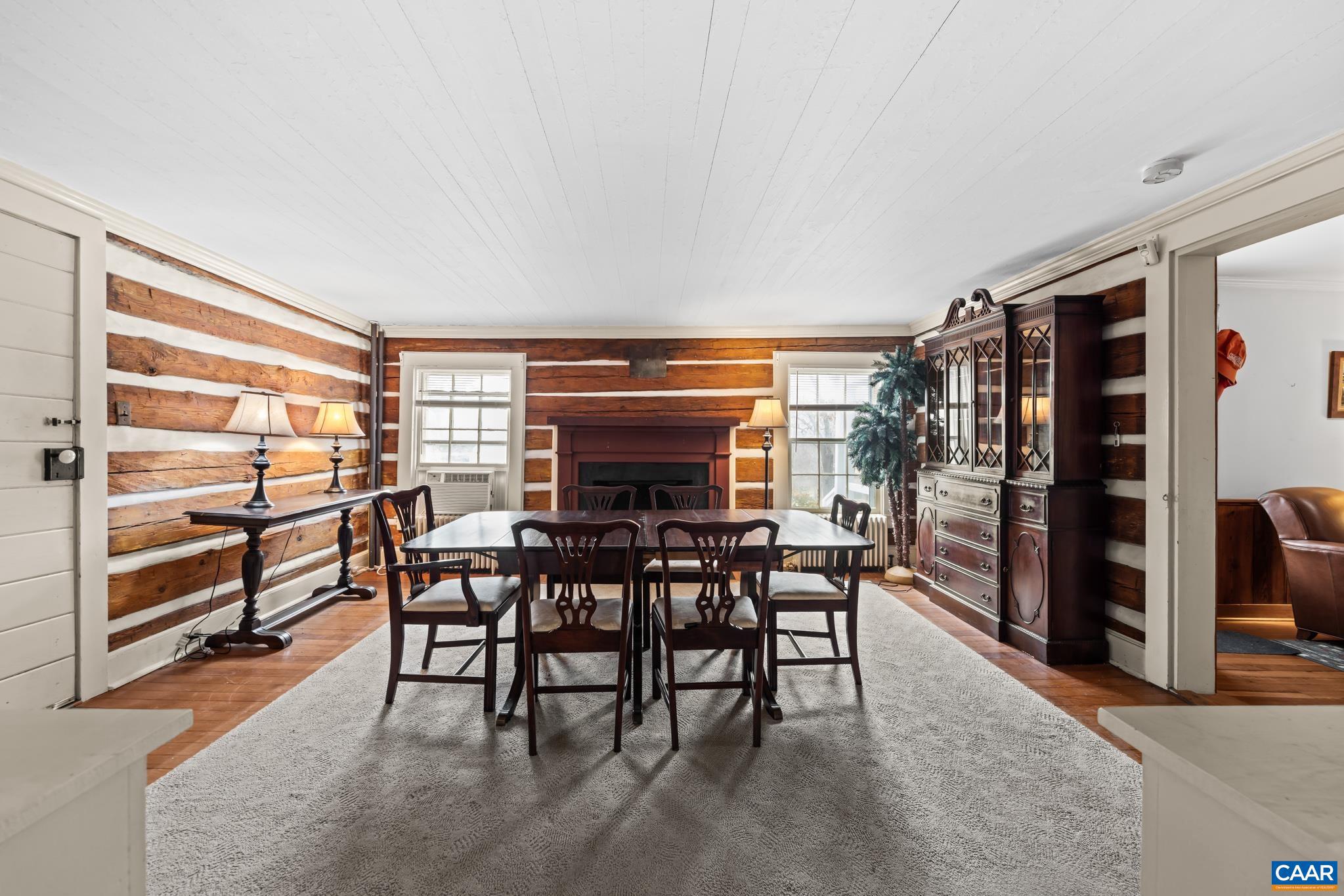 1128 Beaverdam Road Keswick, VA 22947 - Photo 54 of 74 a view of a dining room with furniture and chandelier