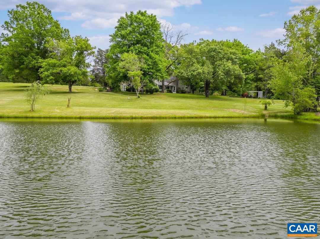 1128 Beaverdam Road Keswick, VA 22947 - Photo 6 of 74 a view of a swimming pool and a yard