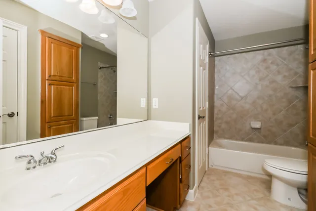 an aerial view of a house with yard swimming pool and outdoor seating