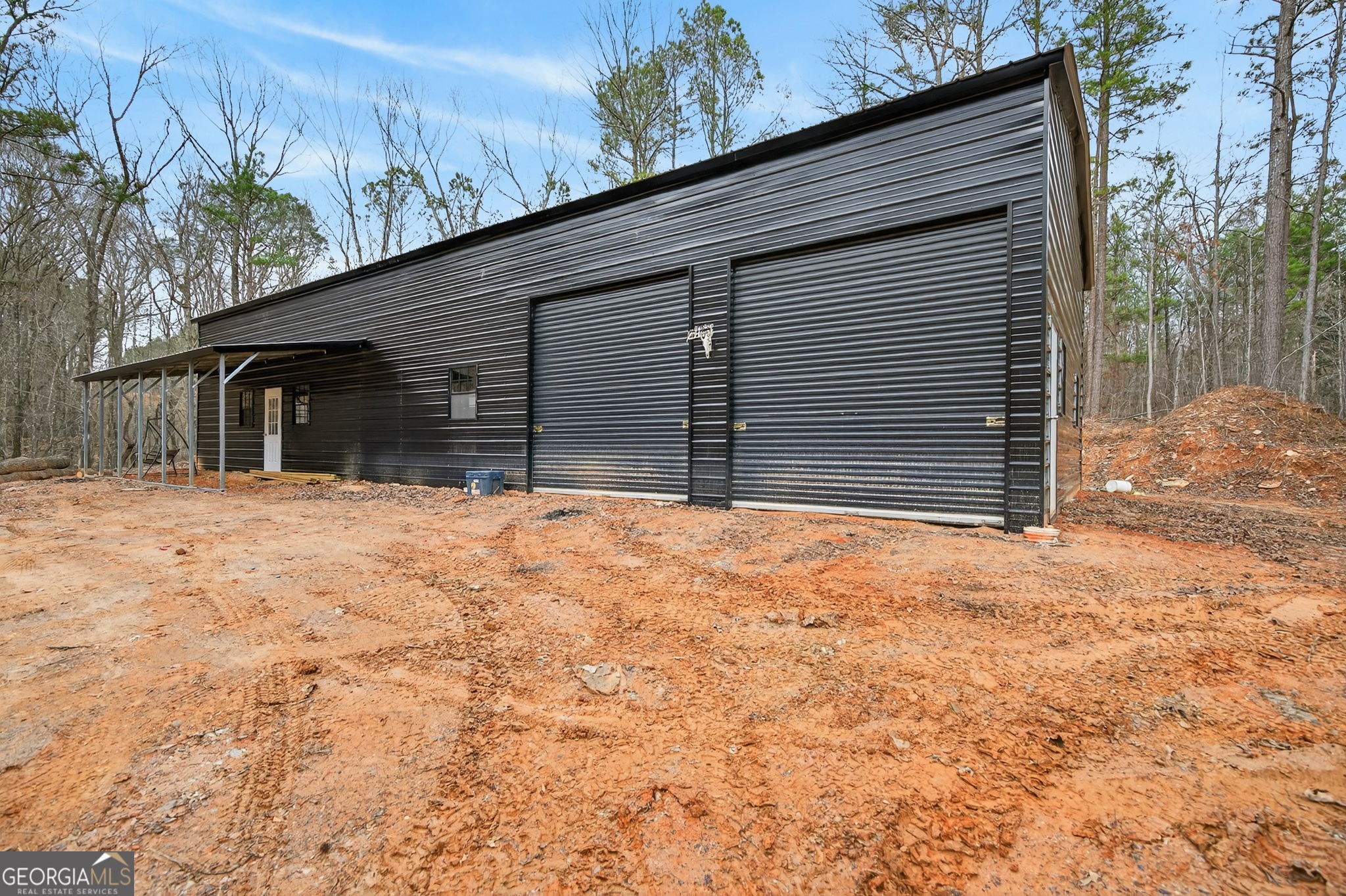a house with trees in the background