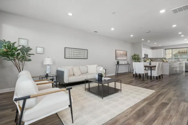 a living room with furniture and a table