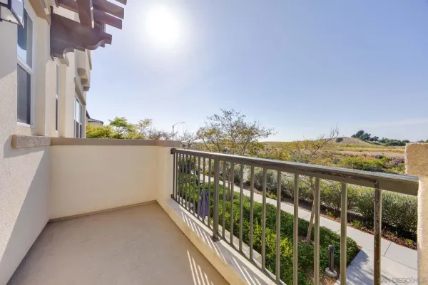 a view of a balcony with an outdoor space