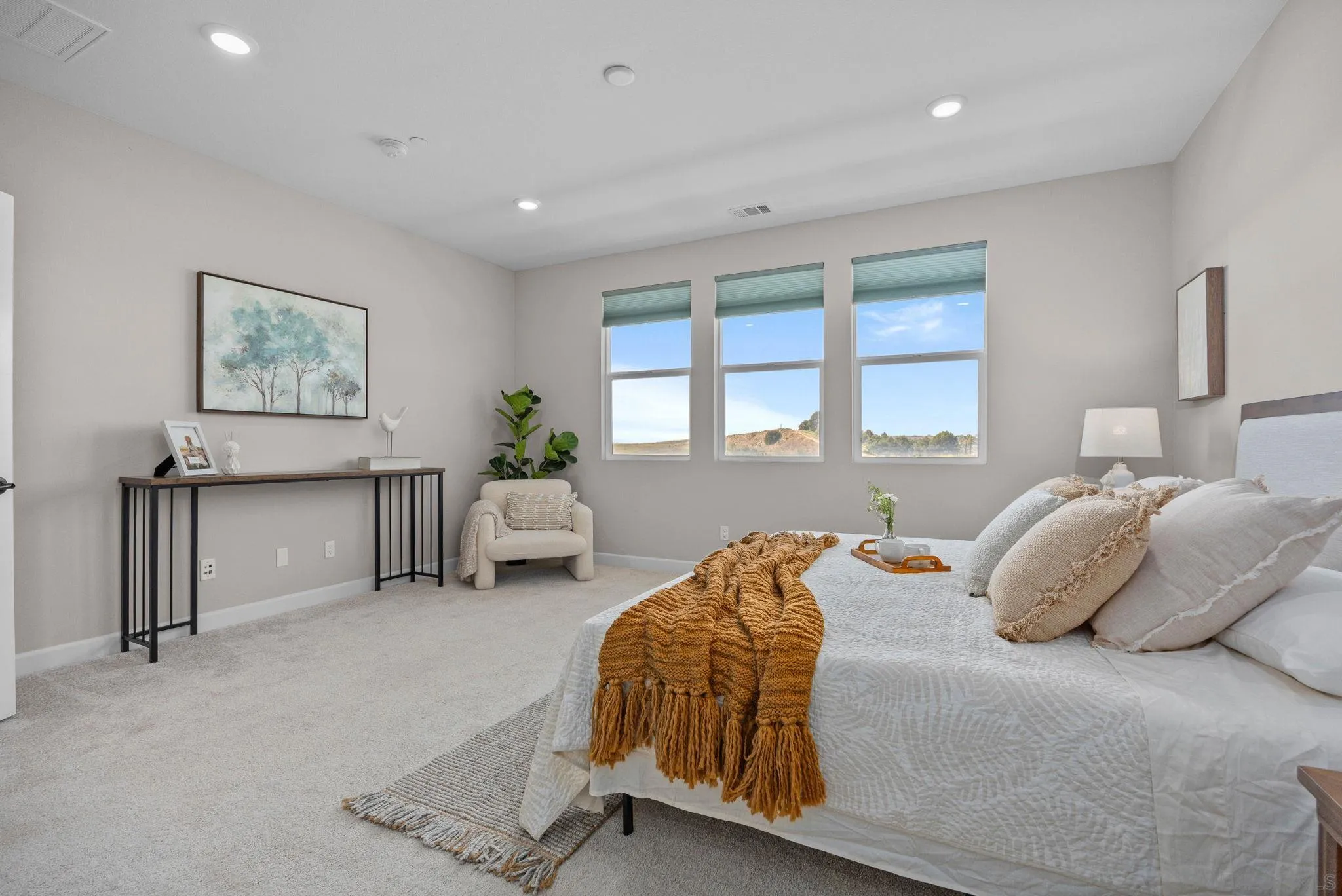 3574 Conner Way Oceanside, CA 92056 - Photo 21 of 52 a bedroom with a bed and a painting on the wall