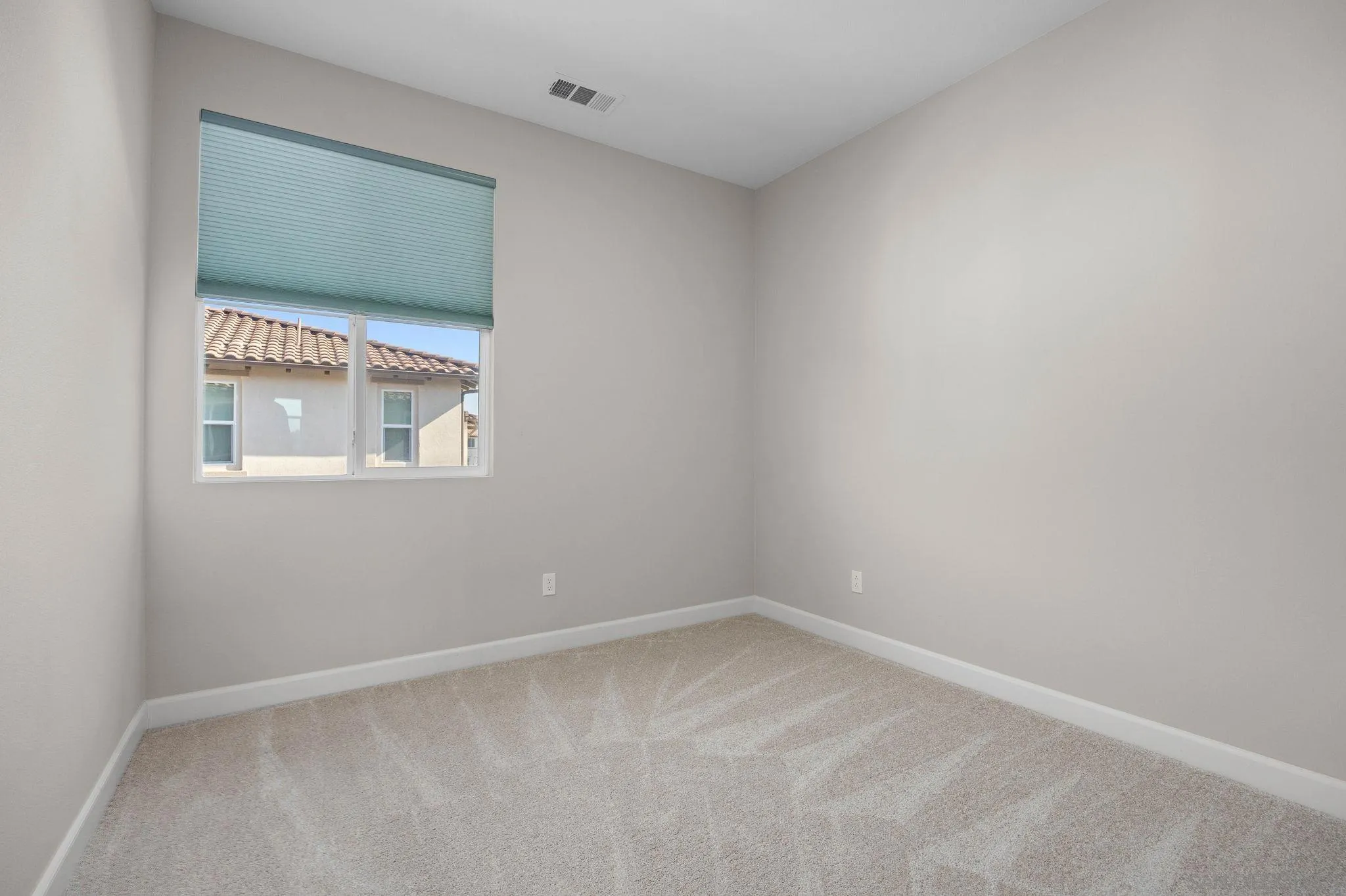 3574 Conner Way Oceanside, CA 92056 - Photo 27 of 52 an empty room with a window