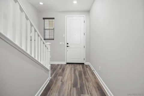 a view of a building with potted plants