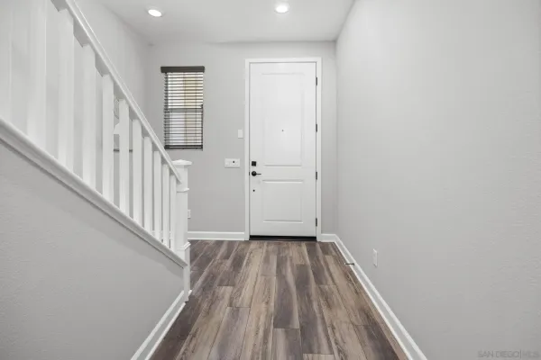 a view of a building with potted plants