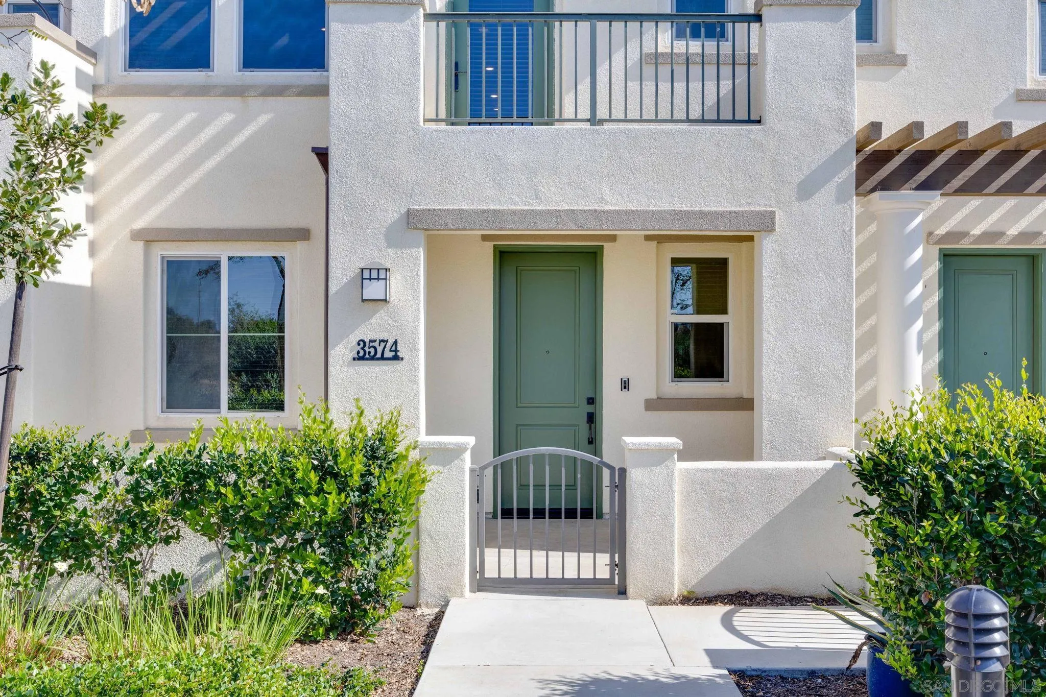3574 Conner Way Oceanside, CA 92056 - Photo 51 of 52 a view of a building with potted plants