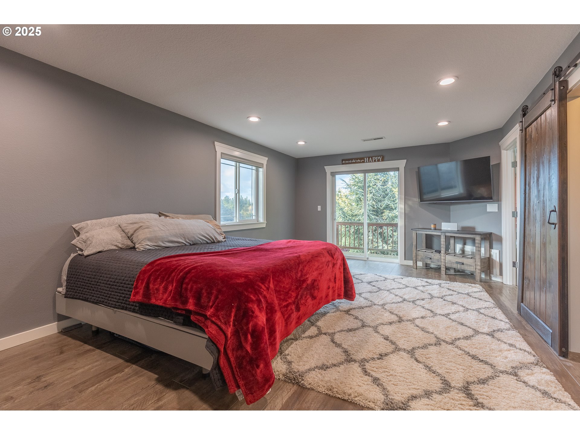 35645 Southeast Dunn Road Boring, OR 97009 - Photo 14 of 30 a spacious bedroom with a large bed and a large window