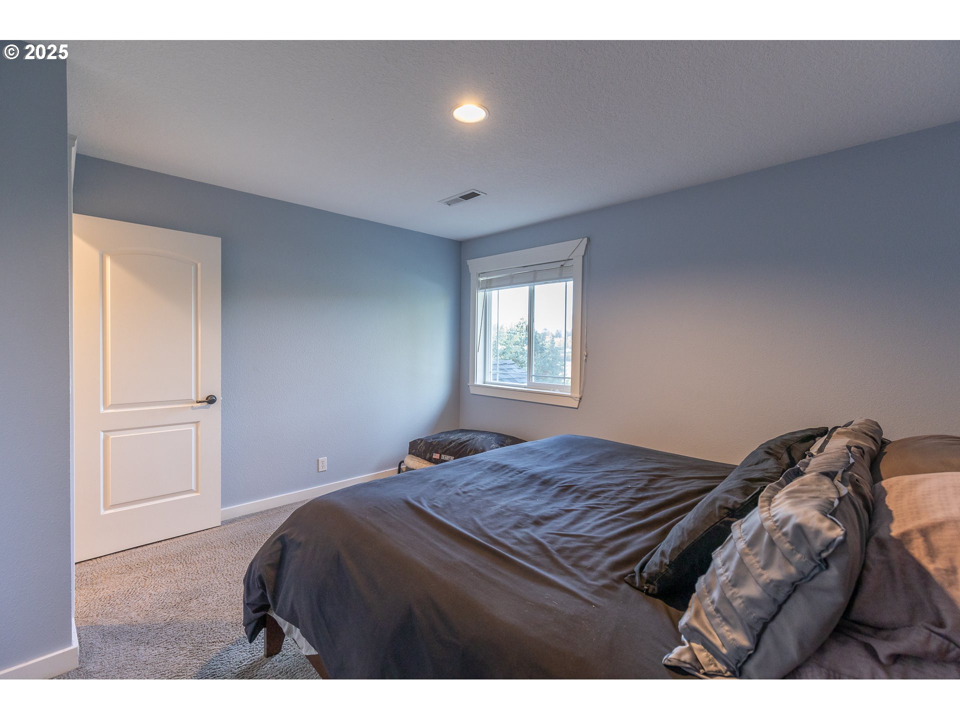 35645 Southeast Dunn Road Boring, OR 97009 - Photo 16 of 30 a bedroom with a bed window and closet