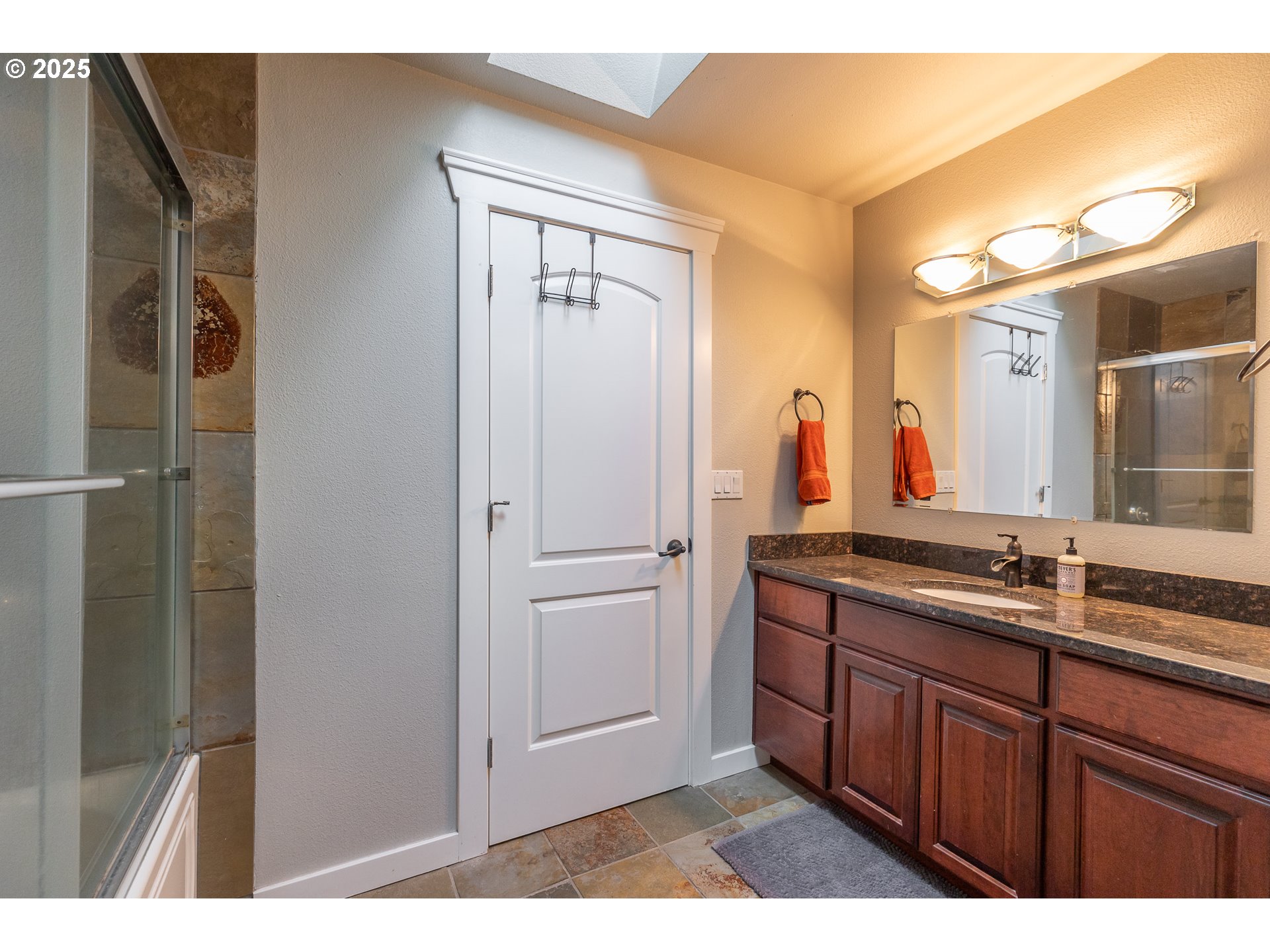 35645 Southeast Dunn Road Boring, OR 97009 - Photo 18 of 30 a bathroom with a double vanity sink and mirror
