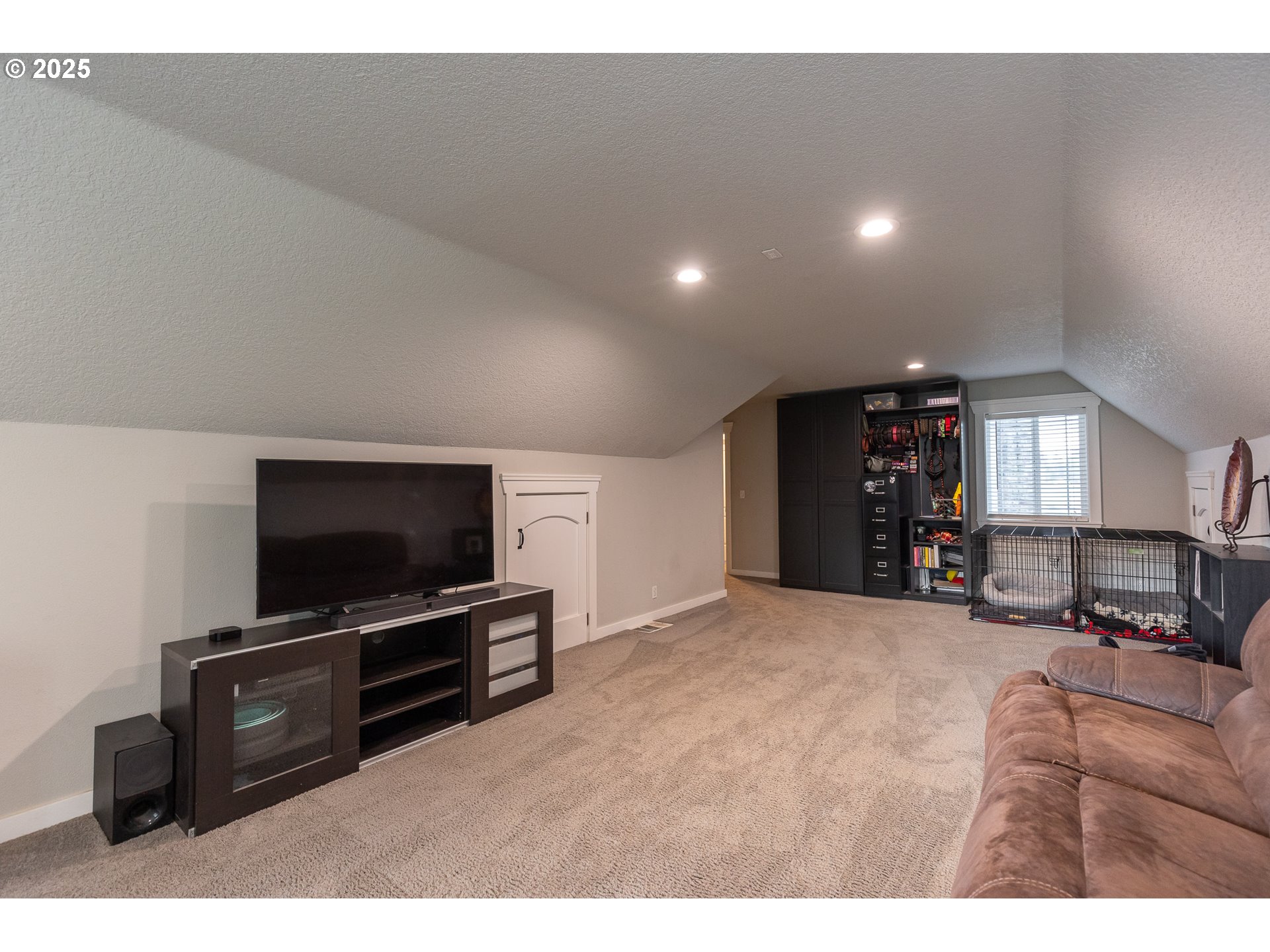 35645 Southeast Dunn Road Boring, OR 97009 - Photo 21 of 30 a living room with furniture and a flat screen tv
