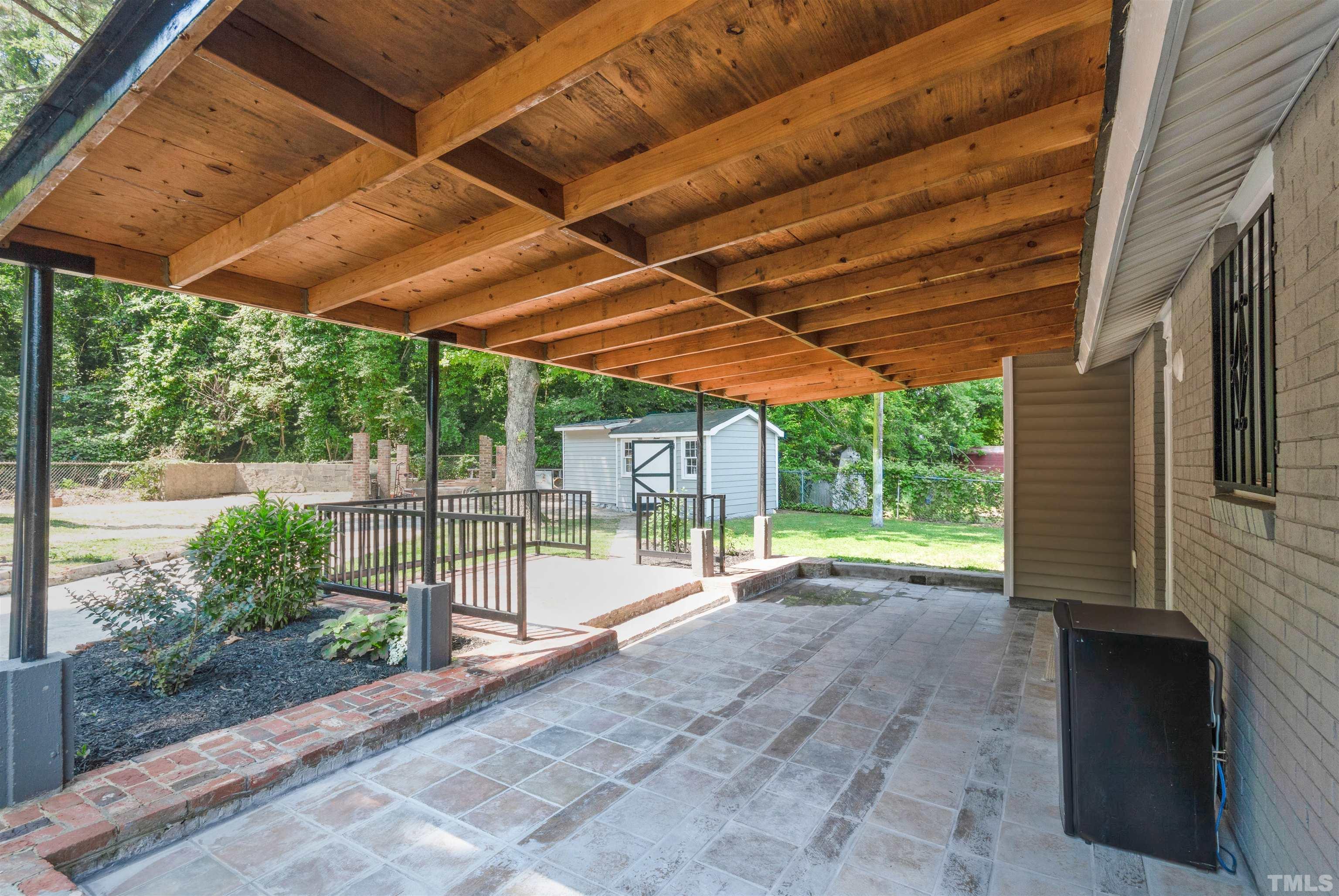 908 Hadley Road Raleigh, NC 27610 - Photo 18 of 21 a view of porch with a backyard