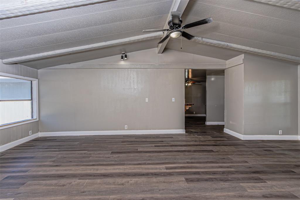 17381 Gaffield Road Justin, TX 76247 - Photo 13 of 38 a view of a livingroom with wooden floor