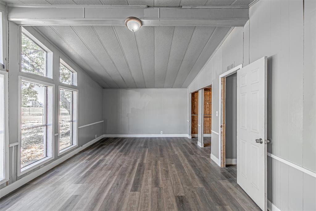 17381 Gaffield Road Justin, TX 76247 - Photo 24 of 38 a view of empty room with wooden floor and fan