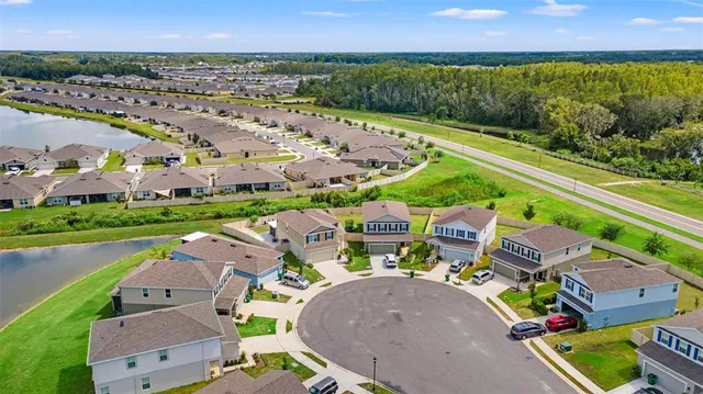 an aerial view of a house with a garden