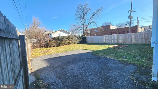 a view of a backyard of the house