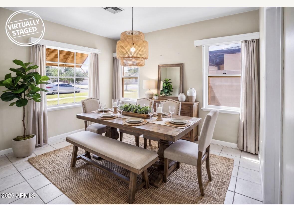 508 North Robson Mesa, AZ 85201 - Photo 5 of 19 a view of a dining room with furniture window and wooden floor