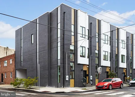 a cars parked in front of a building