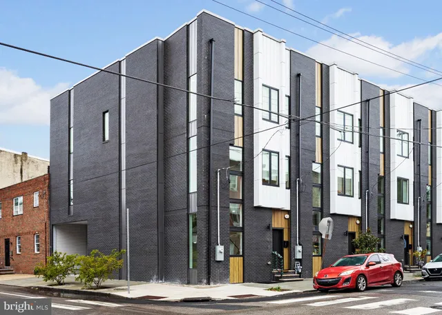 a cars parked in front of a building