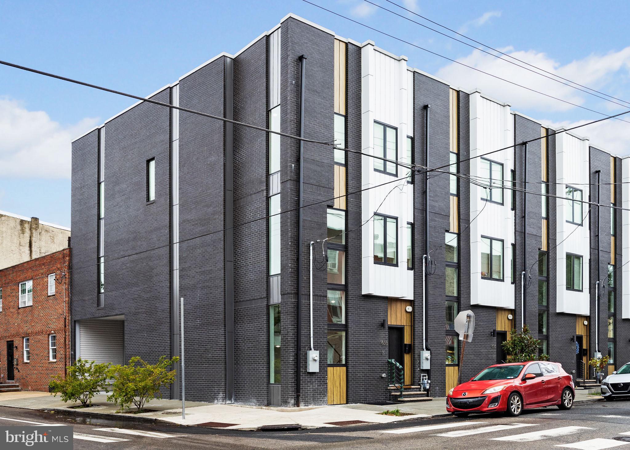 a cars parked in front of a building